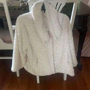 White faux fur coat